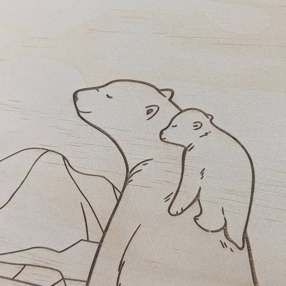 Détail de la gravure laser sur bois du duo ours polaire et ourson